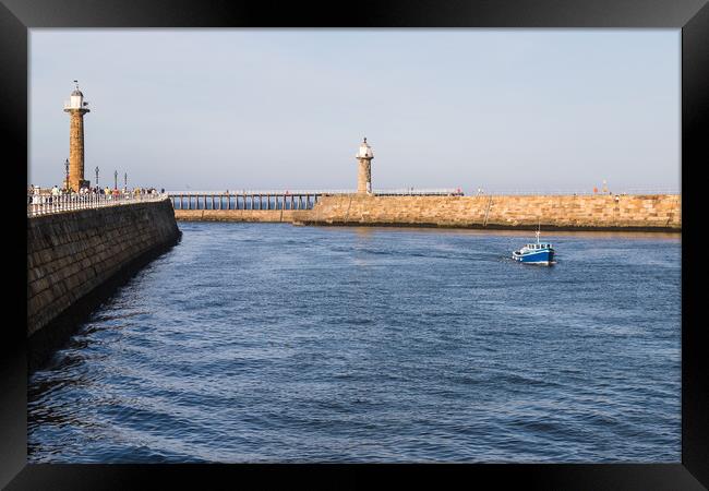 Fishing boat enters Whitby harbour Framed Print by Jason Wells