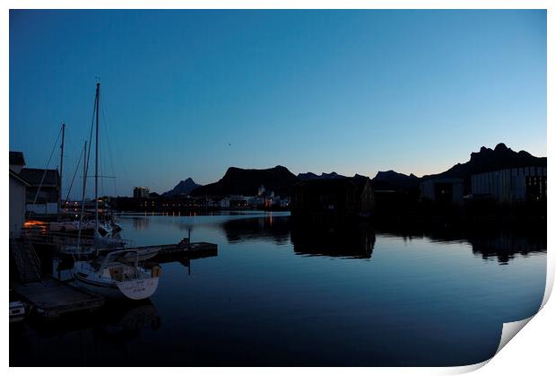 A boat is docked in a harbor at the blue hour, in a fjord Print by Alessandro Della Torre