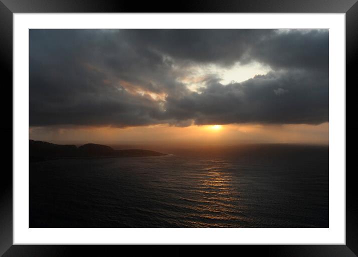Sunset under cloudly grey clouds over northern sea ocean at north cape Framed Mounted Print by Alessandro Della Torre