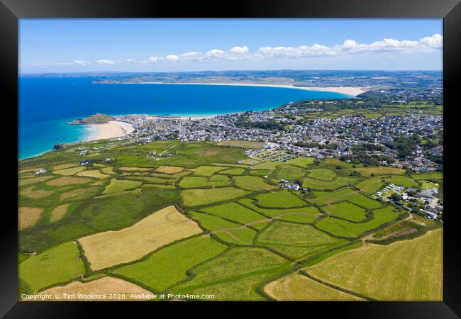 Aerial photograph of St Ives taken towards Hayle Framed Print by Tim Woolcock