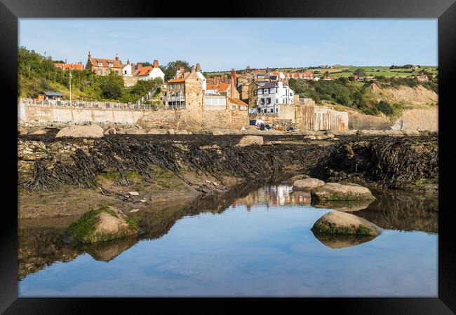 Rockpools in front of Robin Hoods Bay Framed Print by Jason Wells