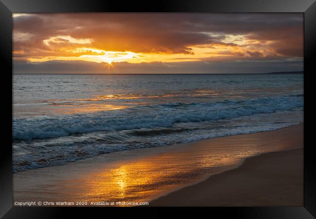 Algarve sunset - sun setting above the waves  Framed Print by Chris Warham
