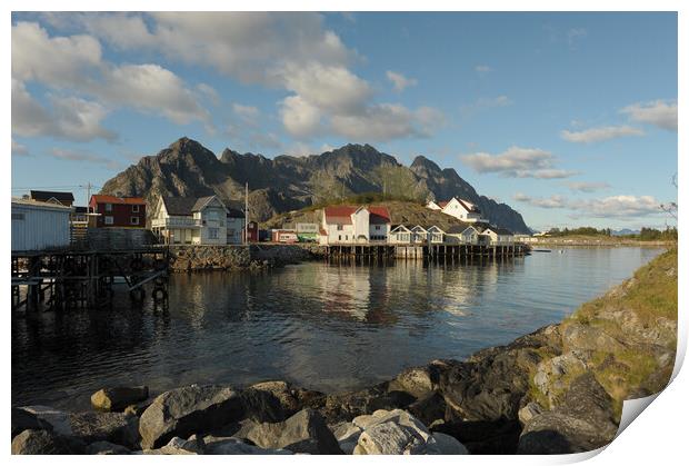 Lofoten island in front of water with a mountain in the background Print by Alessandro Della Torre