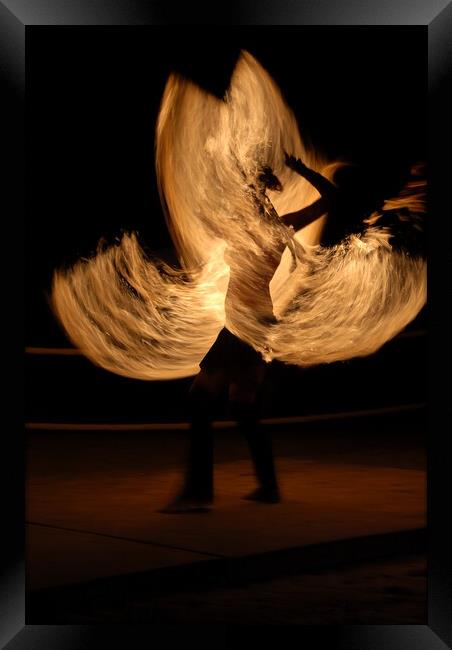 Fire dancer making night show with flames rotaint torch Framed Print by Alessandro Della Torre