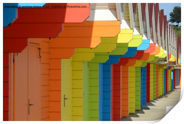 Row of colourful beach huts Print by Andrew Heaps