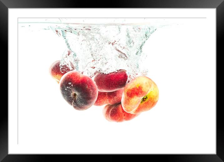 Bunch of doughnut peaches isolated on white, splashing into water. Framed Mounted Print by Przemek Iciak