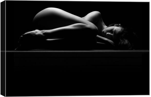 Nude woman fine art naked lying sleeping on black Canvas Print by Alessandro Della Torre