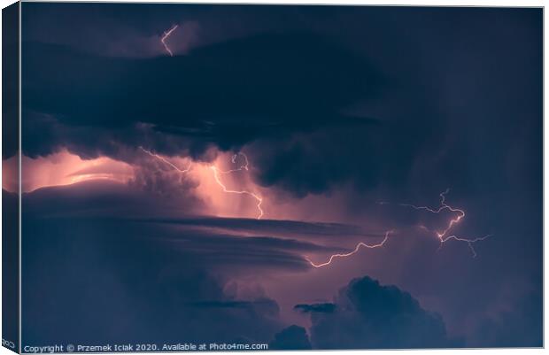 Lightning strike on the dark cloudy sky Canvas Print by Przemek Iciak