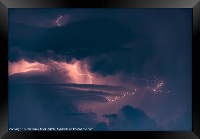 Lightning strike on the dark cloudy sky Framed Print by Przemek Iciak