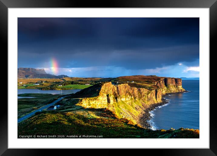 The end of a rainbow at sunrise, the cliffs of Kilt Rock with loch Mealt behind. Framed Mounted Print by Richard Smith