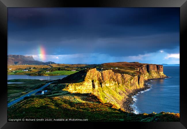 The end of a rainbow at sunrise, the cliffs of Kilt Rock with loch Mealt behind. Framed Print by Richard Smith
