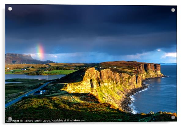 The end of a rainbow at sunrise, the cliffs of Kilt Rock with loch Mealt behind. Acrylic by Richard Smith