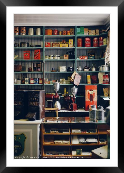 Shelves with products in old store Framed Mounted Print by Joaquin Corbalan