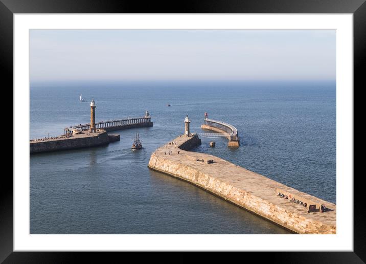 Boat exiting Whitby Framed Mounted Print by Jason Wells