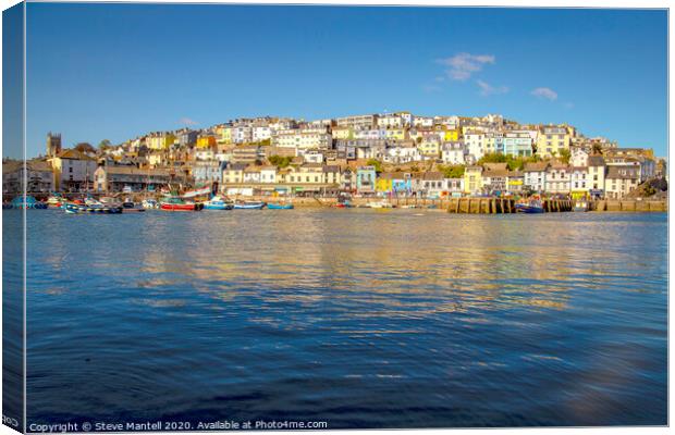 Brixham town houses in early morning sunshine Canvas Print by Steve Mantell