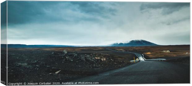 Asphalt mountain roads crossing dangerous Icelandic passes during a trip. Canvas Print by Joaquin Corbalan