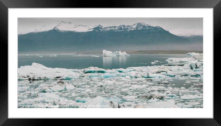 Huge blocks of ice on Glacial river and blue icebergs on Jokulsarlon glacier lake. Vatnajokull National Park, Iceland. Framed Mounted Print by Joaquin Corbalan