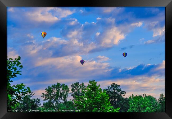 Three hot air balloons over trees Framed Print by Darryl Brooks