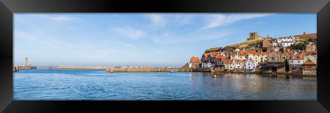 Whitby harbour entrance and East cliff Framed Print by Jason Wells