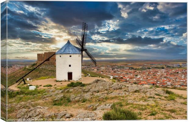 Windmill overlooking town of Consuegra, Spain Canvas Print by Kevin Hellon