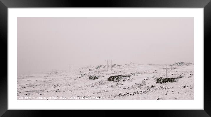 Mountains barely snowed at the beginning of winter. Framed Mounted Print by Joaquin Corbalan