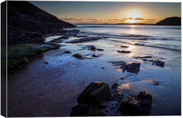 Sunset on Manorbier beach Canvas Print by Leighton Collins