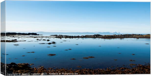 Scene of tranquility and relaxation in a calm sea in nature Canvas Print by Joaquin Corbalan
