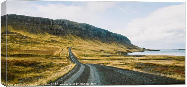 Asphalt mountain roads crossing dangerous Icelandic passes during a trip. Canvas Print by Joaquin Corbalan