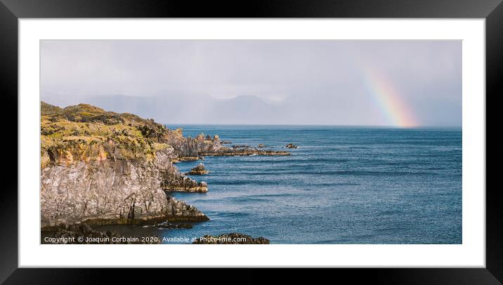 Rainbow over the Icelandic coast in the middle of nature. Framed Mounted Print by Joaquin Corbalan