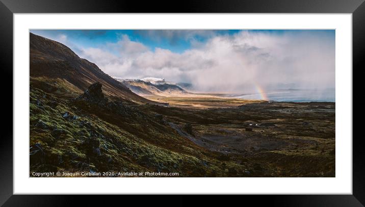 Rainbow over the Icelandic coast in the middle of nature. Framed Mounted Print by Joaquin Corbalan