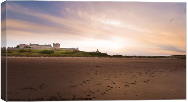 Bamburgh Castle at sunset Canvas Print by Louise Wilden