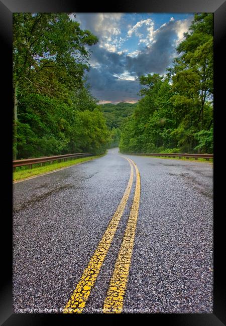 Mountain Road into Distance Framed Print by Darryl Brooks