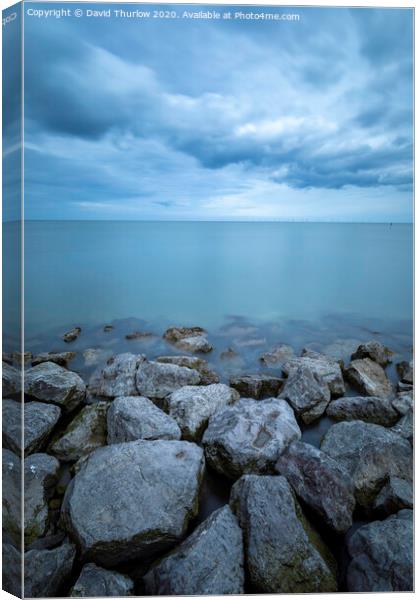 Breakwater Storm Canvas Print by David Thurlow