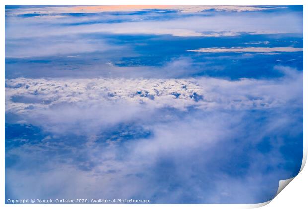 Sea of blue and white clouds seen from above. Print by Joaquin Corbalan