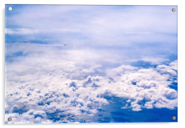 Plane of commercial flights crossing a sky of blue and white clouds seen from above, on the Mediterranean. Acrylic by Joaquin Corbalan
