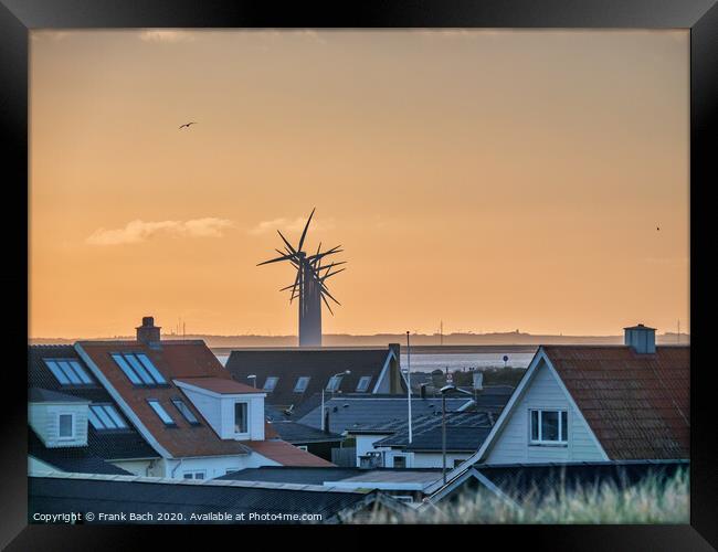 Thyboroen village at sunrise  with windfarm, Denmark Framed Print by Frank Bach