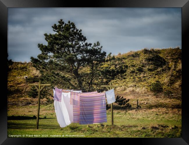 Washing hanging to dry on Mandoe island in the wadden sea, Esbjerg Denmark Framed Print by Frank Bach