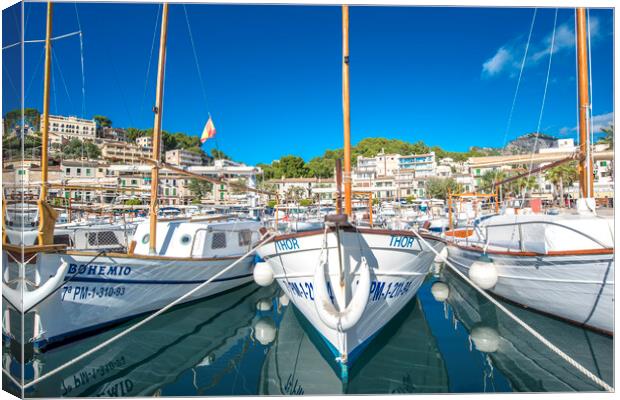 Small boats in the port of soller Canvas Print by Perry Johnson