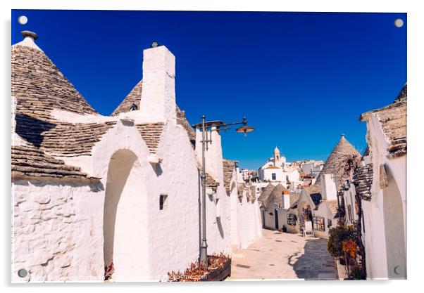 Narrow streets between the trulli of Alberobello, in southern Italy, ideal for family trips. Acrylic by Joaquin Corbalan