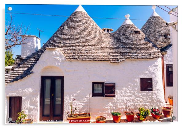 Houses of the tourist and famous Italian city of Alberobello, with its typical white walls and trulli conical roofs. Acrylic by Joaquin Corbalan