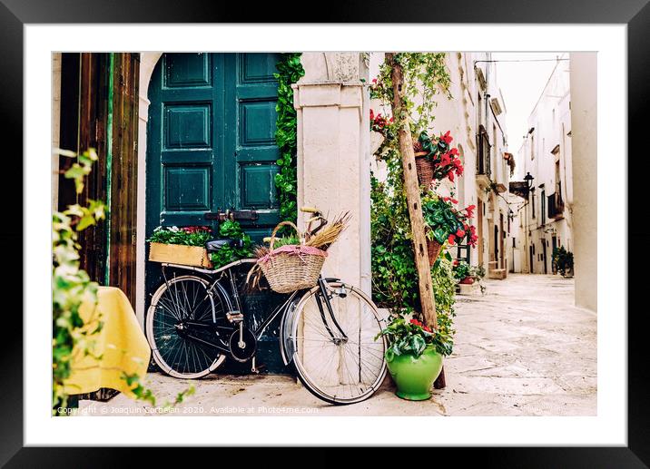 Narrow streets of the beautiful city of Bari, ideal for strolling when we tour in Italy. Framed Mounted Print by Joaquin Corbalan