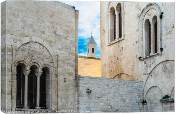 Stone walls of the medieval cathedral of San Nicolas di Bari. Canvas Print by Joaquin Corbalan