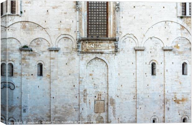 Stone walls of the medieval cathedral of San Nicolas di Bari. Canvas Print by Joaquin Corbalan