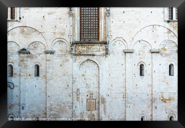 Stone walls of the medieval cathedral of San Nicolas di Bari. Framed Print by Joaquin Corbalan