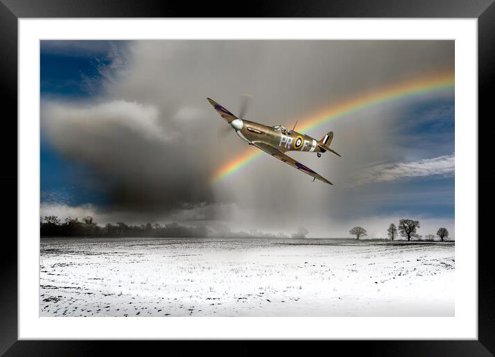 Spitfire with snow shower rainbow Framed Mounted Print by Gary Eason