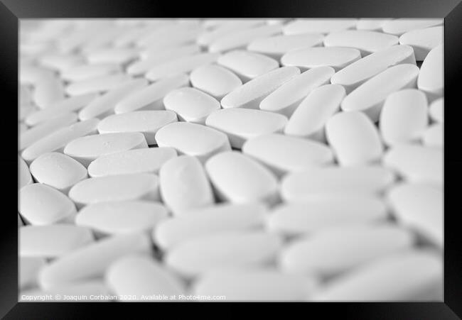 Macro close-up of many white pills, medication concept Framed Print by Joaquin Corbalan
