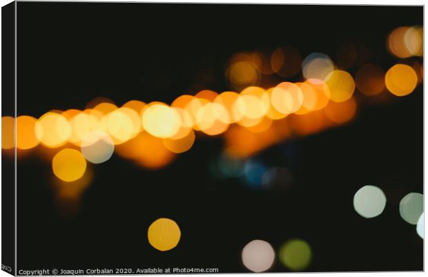 bokeh light defocused blurred background, colorful night lights with black background Canvas Print by Joaquin Corbalan