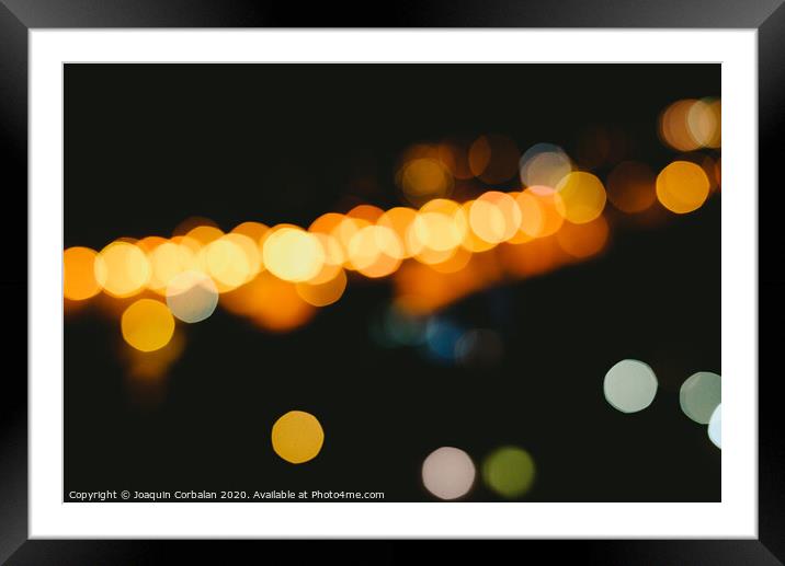 bokeh light defocused blurred background, colorful night lights with black background Framed Mounted Print by Joaquin Corbalan