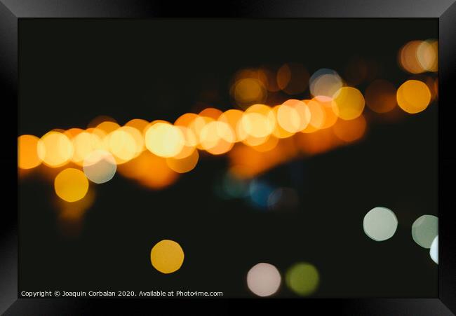 bokeh light defocused blurred background, colorful night lights with black background Framed Print by Joaquin Corbalan