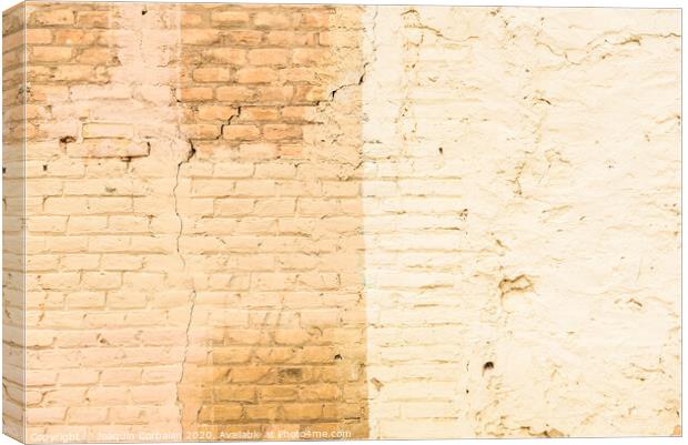 Texture of a brick wall painted in orange tones, ideal for background with space for free text. Canvas Print by Joaquin Corbalan